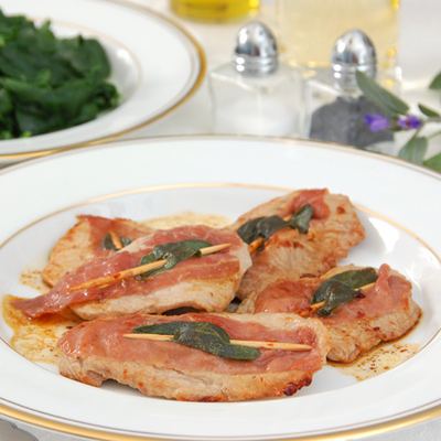 Escalope de veau de grain du Québec et fricassée de pommes fruits au jambon sec et cidre de glace