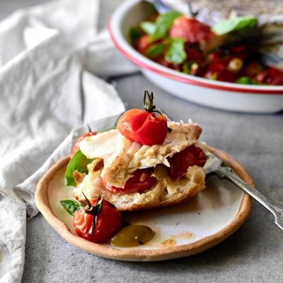 Roasted black sea bass with garlicky cherry tomatoes