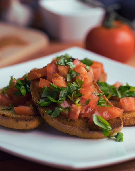 Bruschetta with colourful tomatoes and basil