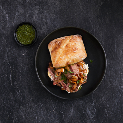 Open Faced Steak Sandwich with Caramelized Onions and Chimichurri Sauce